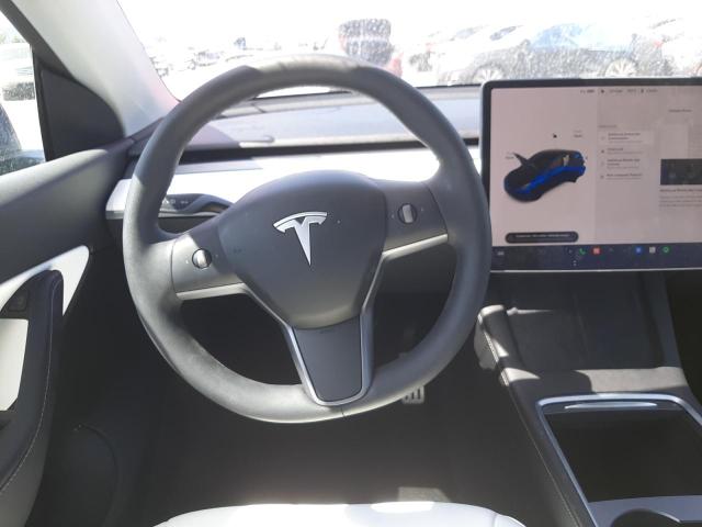 Photo 9 from auction – 2022 TESLA MODEL Y with VIN 7SAYGDEF9NF339919