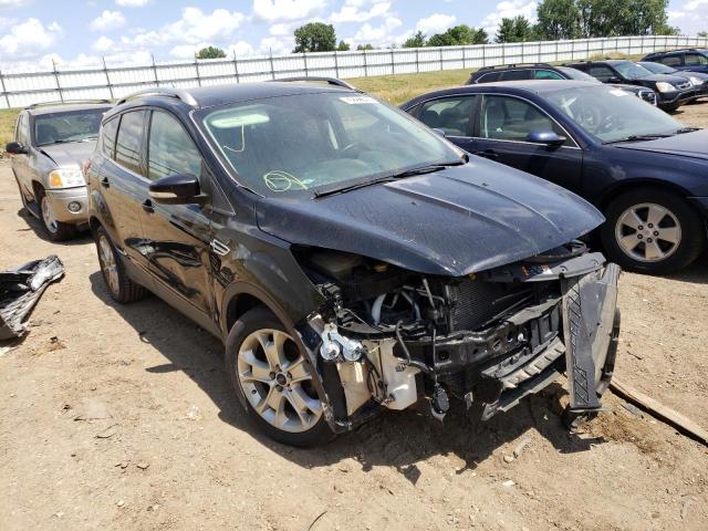 FORD ESCAPE TIT 2016 with VIN 1FMCU0JX4GUB70387 - Photo from auction