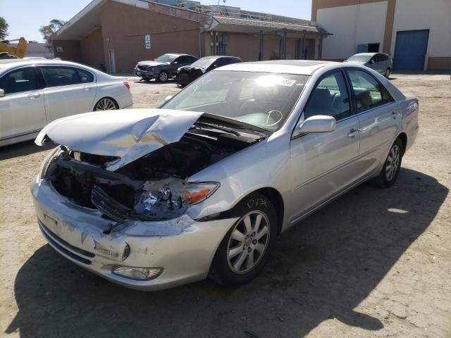 Photo 2 from auction – 2004 TOYOTA CAMRY LE with VIN 4T1BF30K04U586073
