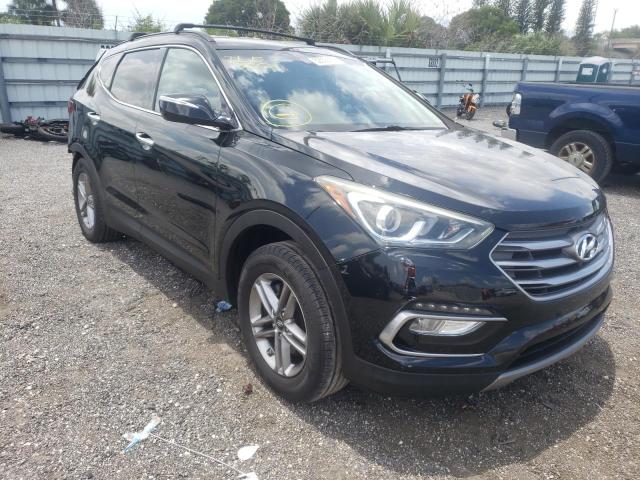 HYUNDAI SANTA FE S 2017 with VIN 5NMZU3LB9HH033116 - Photo from auction