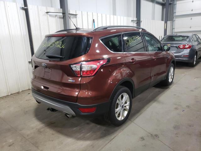 Photo 4 from auction – 2018 FORD ESCAPE SE with VIN 1FMCU9GD8JUA85447