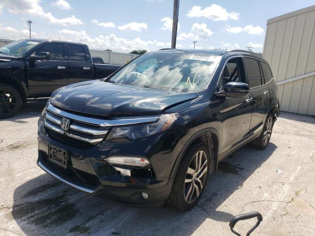 Photo 2 from auction – 2016 HONDA PILOT TOUR with VIN 5FNYF6H95GB116281
