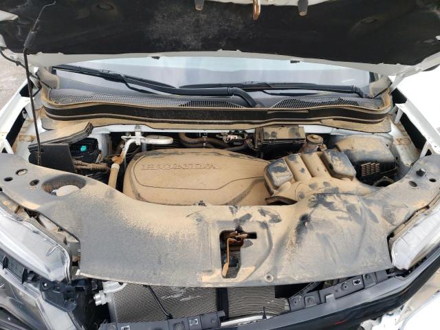 Photo 7 from auction – 2021 HONDA PASSPORT E with VIN 5FNYF7H57MB004709
