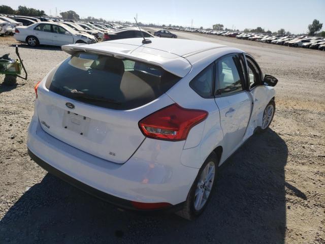 Photo 4 from auction – 2018 FORD FOCUS SE with VIN 1FADP3K20JL304013