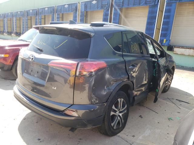 Photo 4 from auction – 2018 TOYOTA RAV4 LE with VIN 2T3ZFREV6JW521414