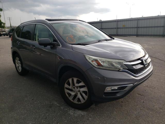 Photo 1 from auction – 2015 HONDA CR-V EXL with VIN 2HKRM3H77FH537152