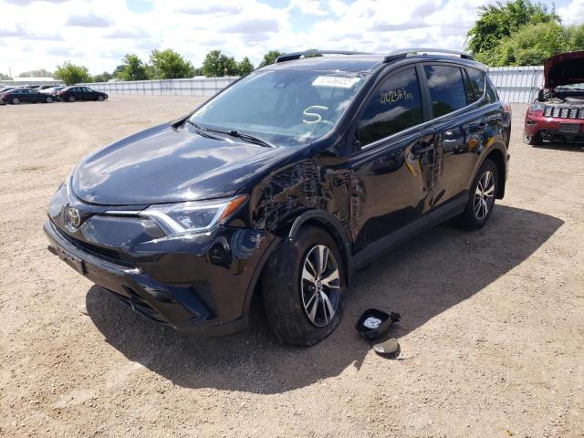 Photo 2 from auction – 2018 TOYOTA RAV4 LE with VIN 2T3ZFREV8JW513153