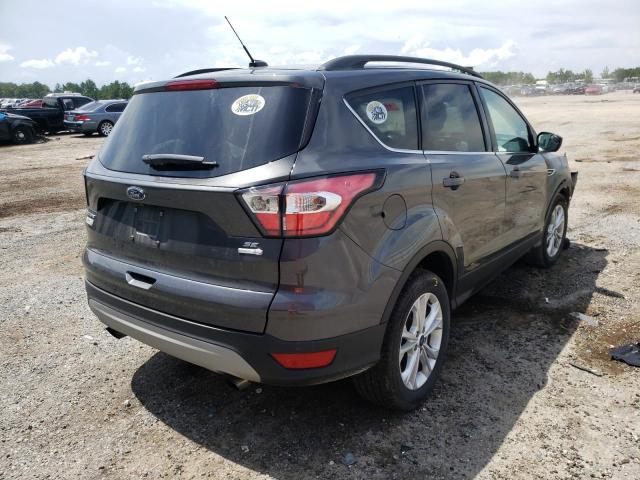Photo 4 from auction – 2018 FORD ESCAPE SE with VIN 1FMCU9GD3JUA77644