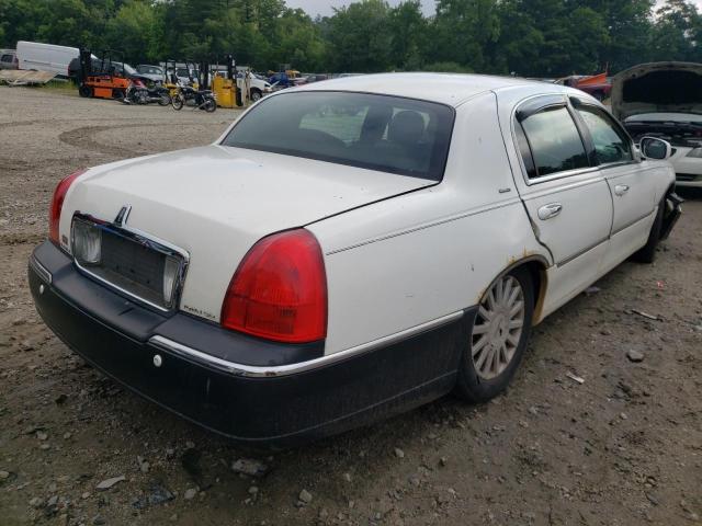 Photo 4 from auction – 2004 LINCOLN TOWN CAR U with VIN 1LNHM83W94Y665519