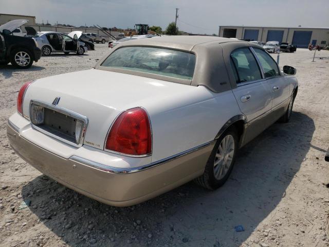 Photo 4 from auction – 2004 LINCOLN TOWN CAR E with VIN 1LNHM81W54Y641463