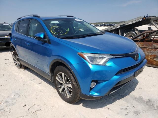 TOYOTA RAV4 ADVEN 2018 with VIN 2T3RFREV0JW797765 - Photo from auction