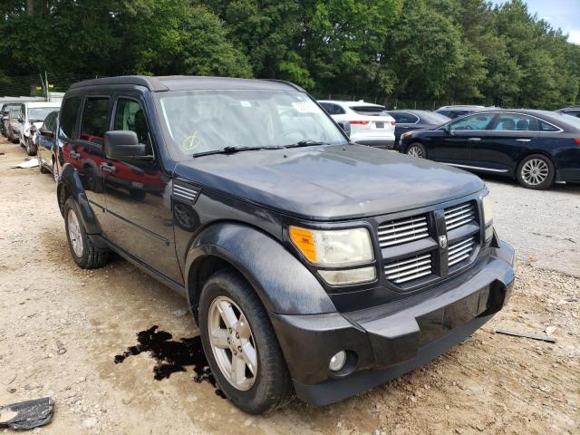 DODGE NITRO SXT 2011 with VIN 1D4PU5GK0BW568176 - Photo from auction