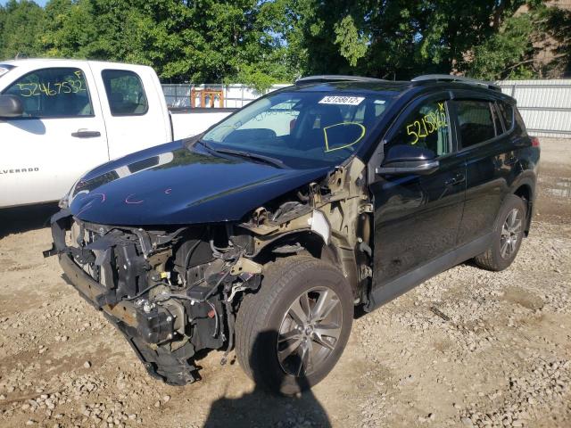 Photo 2 from auction – 2017 TOYOTA RAV4 XLE with VIN 2T3RFREV1HW660988