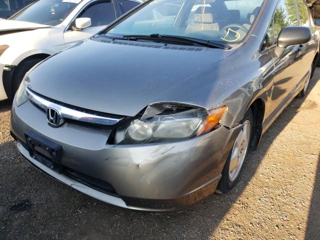 Photo 9 from auction – 2006 HONDA CIVIC DX V with VIN 2HGFA16366H004994