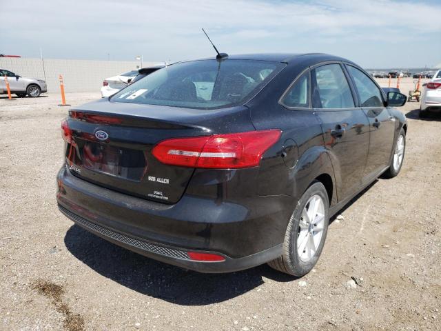 Photo 4 from auction – 2015 FORD FOCUS SE with VIN 1FADP3F28FL330439