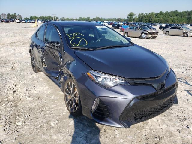 TOYOTA COROLLA L 2018 with VIN 5YFBURHE0JP813038 - Photo from auction