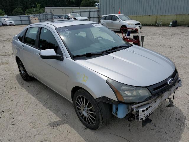 FORD FOCUS SES 2011 with VIN 1FAHP3GNXBW143111 - Photo from auction