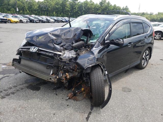 Photo 2 from auction – 2016 HONDA CR-V TOURI with VIN 5J6RM4H99GL093335