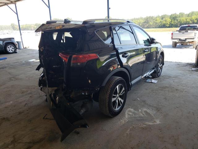 Photo 4 from auction – 2016 TOYOTA RAV4 XLE with VIN 2T3RFREV5GW528153