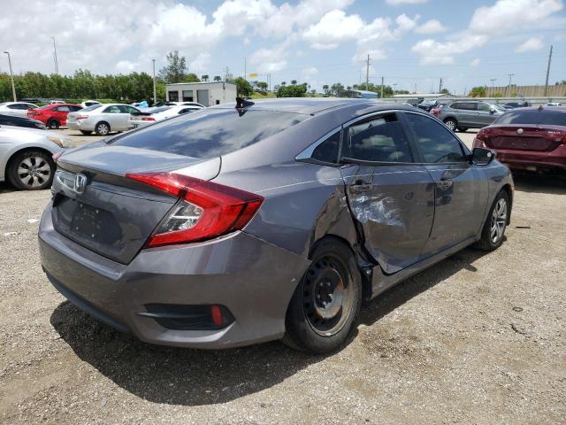 Photo 4 from auction – 2018 HONDA CIVIC LX with VIN 19XFC2F50JE031872