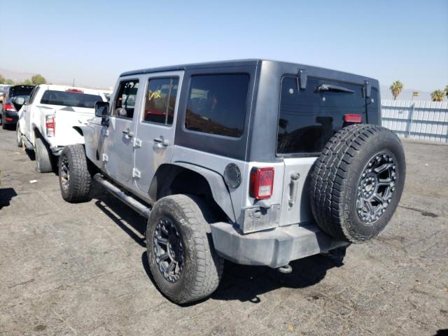 Photo 3 from auction – 2011 JEEP WRANGLER U with VIN 1J4BA3H10BL582326