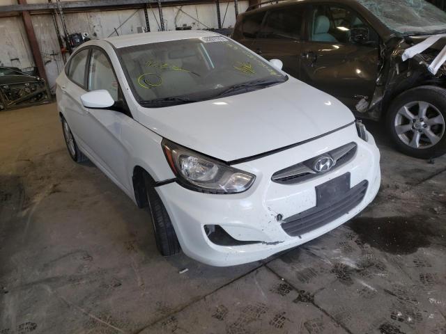 HYUNDAI ACCENT 2012 with VIN KMHCU4AE5CU062487 - Photo from auction
