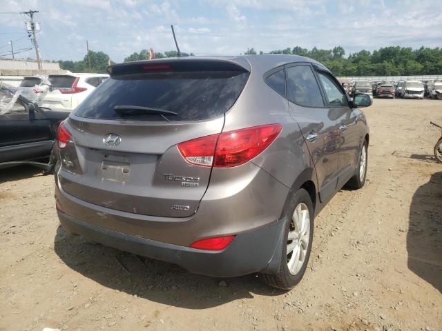 Photo 4 from auction – 2012 HYUNDAI TUCSON GLS with VIN KM8JUCAC8CU538019