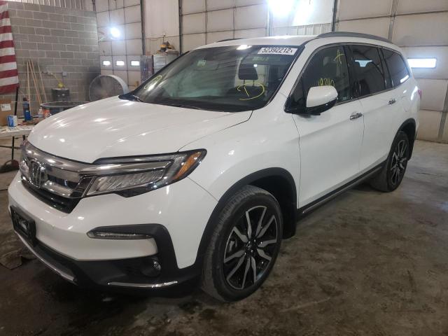 Photo 2 from auction – 2021 HONDA PILOT ELIT with VIN 5FNYF6H08MB029777