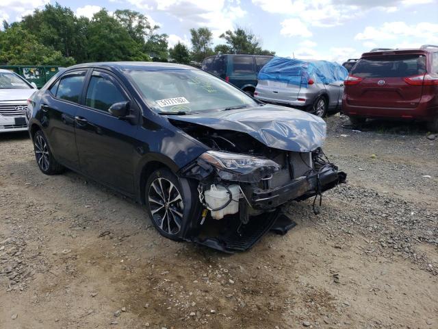 TOYOTA COROLLA L 2017 with VIN 5YFBURHE6HP614330 - Photo from auction