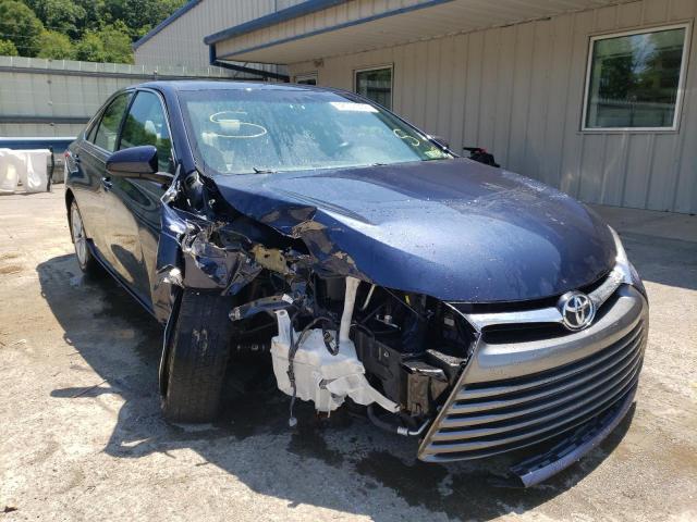 TOYOTA CAMRY LE 2016 with VIN 4T4BF1FKXGR561462 - Photo from auction