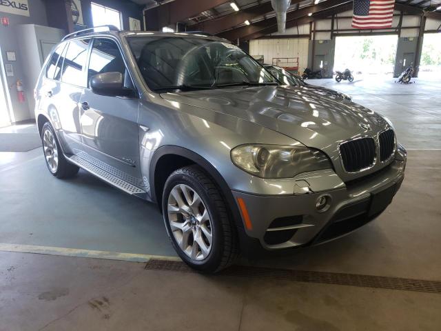 BMW X5 XDRIVE3 2011 with VIN 5UXZV4C5XBL400087 - Photo from auction