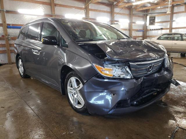 HONDA ODYSSEY TO 2012 with VIN 5FNRL5H99CB142173 - Photo from auction