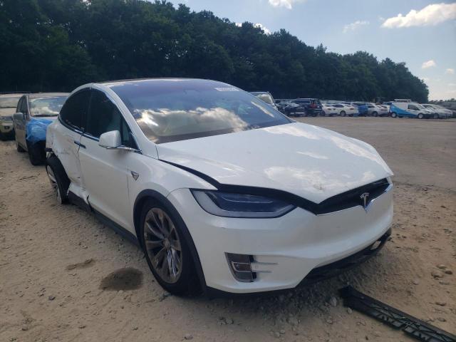 TESLA MODEL X 2018 with VIN 5YJXCBE29JF113931 - Photo from auction
