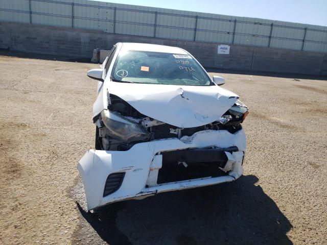 Photo 9 from auction – 2015 TOYOTA COROLLA L with VIN 5YFBURHE0FP301206