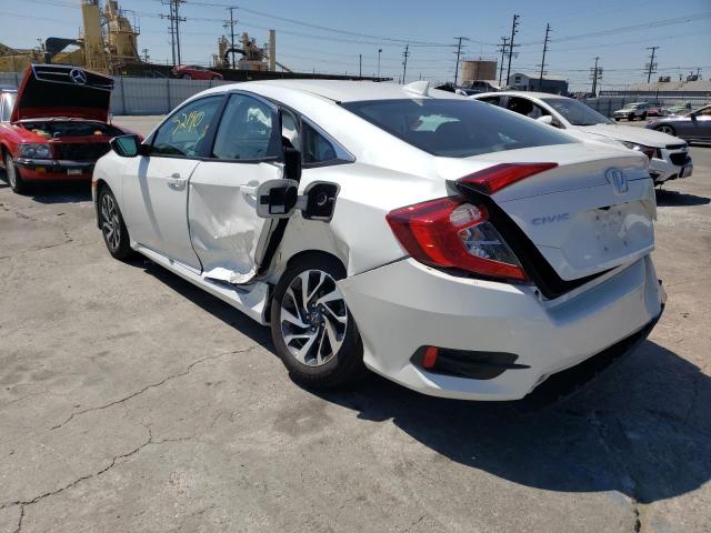 Photo 9 from auction – 2018 HONDA CIVIC EX with VIN 2HGFC2F70JH555711