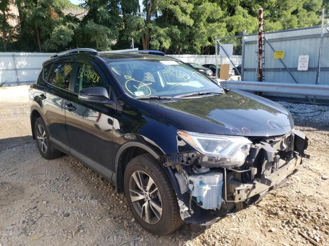 TOYOTA RAV4 XLE 2017 with VIN 2T3RFREV1HW660988 - Photo from auction