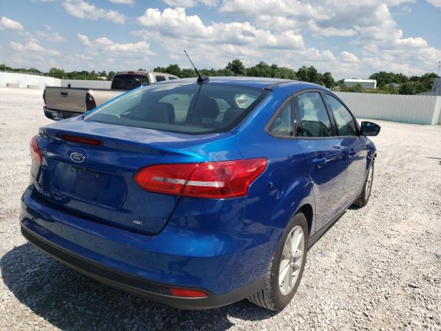 Photo 4 from auction – 2018 FORD FOCUS SE with VIN 1FADP3F29JL320933