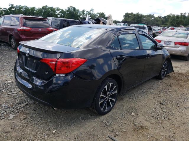 Photo 4 from auction – 2017 TOYOTA COROLLA L with VIN 5YFBURHE6HP614330
