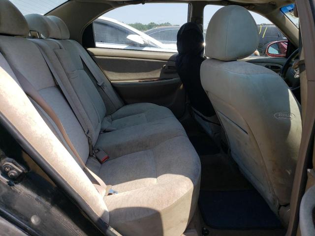 Photo 6 from auction – 2004 KIA OPTIMA LX with VIN KNAGD128845325786