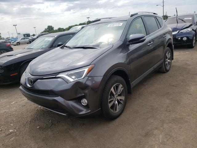 Photo 2 from auction – 2017 TOYOTA RAV4 XLE with VIN JTMRFREVXHJ107044