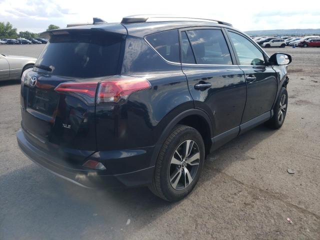 Photo 4 from auction – 2017 TOYOTA RAV4 XLE with VIN 2T3WFREV2HW381424