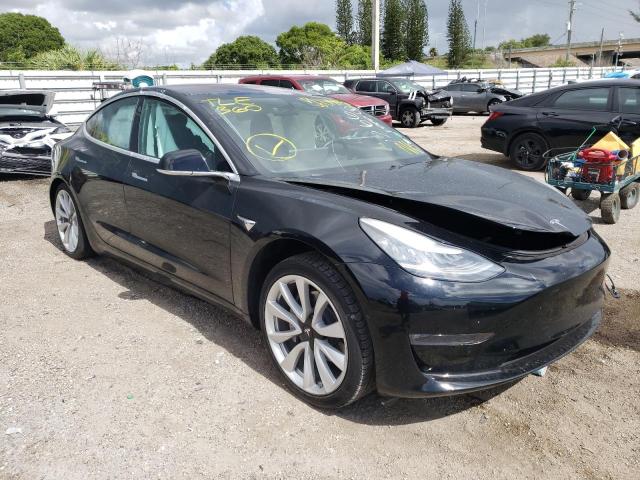 TESLA MODEL 3 2018 with VIN 5YJ3E1EA1JF171266 - Photo from auction