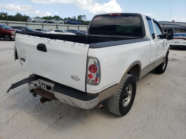 Photo 4 from auction – 2000 FORD F150 with VIN 1FTRX18L0YNA85041