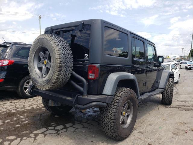 Photo 4 from auction – 2011 JEEP WRANGLER U with VIN 1J4BA3H10BL638233