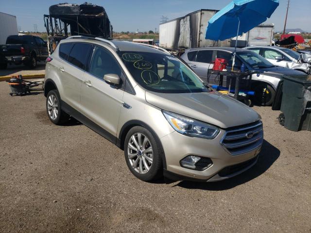 FORD ESCAPE TIT 2017 with VIN 1FMCU9J99HUC51389 - Photo from auction
