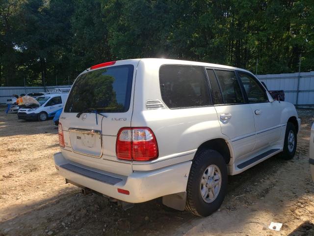 Photo 4 from auction – 1999 LEXUS LX 470 with VIN JT6HT00W5X0074806
