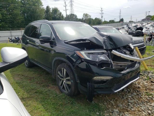 HONDA PILOT TOUR 2016 with VIN 5FNYF6H9XGB076571 - Photo from auction