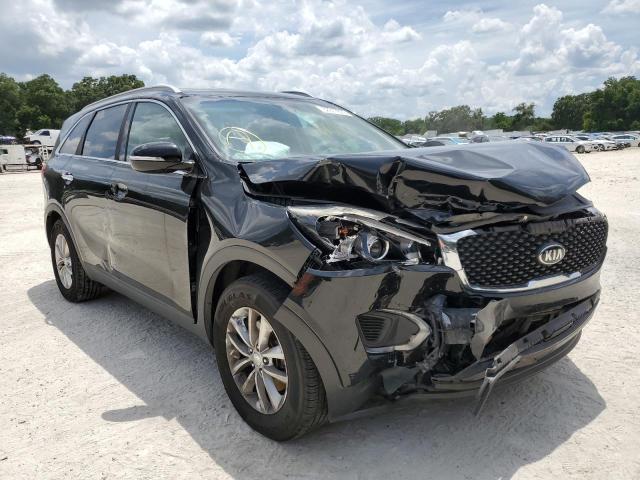 KIA SORENTO LX 2016 with VIN 5XYPG4A35GG143489 - Photo from auction