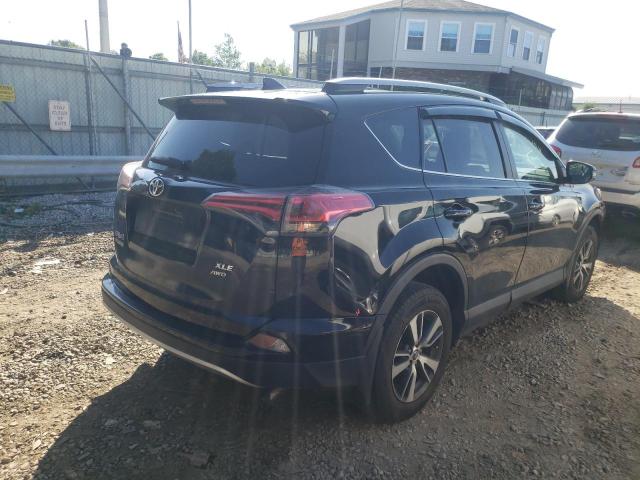 Photo 4 from auction – 2017 TOYOTA RAV4 XLE with VIN 2T3RFREV1HW660988