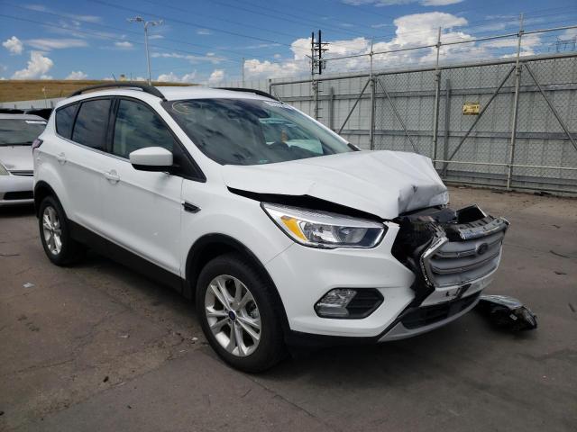 FORD ESCAPE SE 2018 with VIN 1FMCU9GDXJUC35199 - Photo from auction